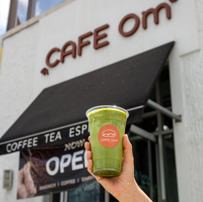 Iced drink with a café logo sticker