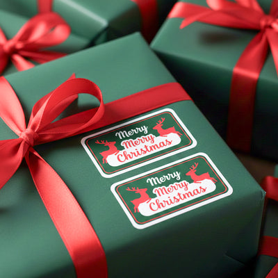 Green gift boxes with Merry Christmas labels